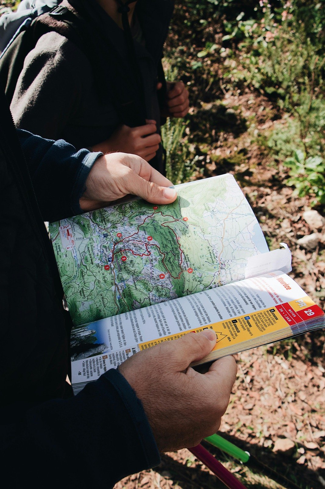 Route map in hand during an outdoor walk